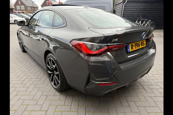 BMW i4 eDrive40 84 kWh | M-Pakket | Schuifdak | Dravitgrau metallic | NL-Auto |