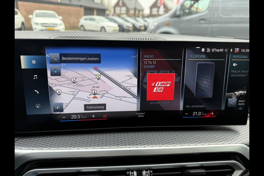 BMW i4 eDrive40 84 kWh | M-Pakket | Schuifdak | Dravitgrau metallic | NL-Auto |