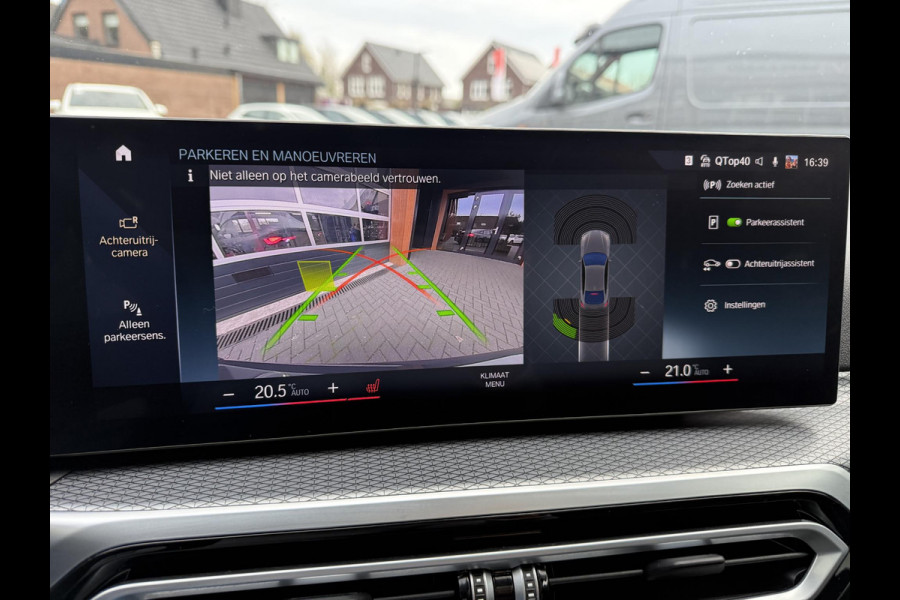 BMW i4 eDrive40 84 kWh | M-Pakket | Schuifdak | Dravitgrau metallic | NL-Auto |