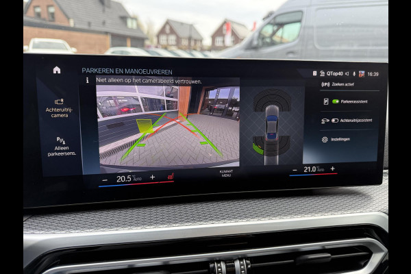 BMW i4 eDrive40 84 kWh | M-Pakket | Schuifdak | Dravitgrau metallic | NL-Auto |