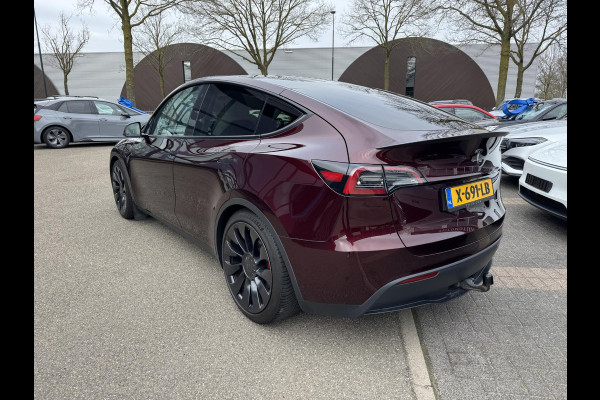 Tesla Model Y Performance AWD 75 kWh AFNEEMBARE TREKHAAK| CHERRY RED| VOLLEDIGE TESLA GARANTIE TOT 14-12-2027 OF 80K KM|1STE EIGENAAR ORIG. NL| AUTOPILOT| STOELVERWARMING VOOR + ACHTER|
