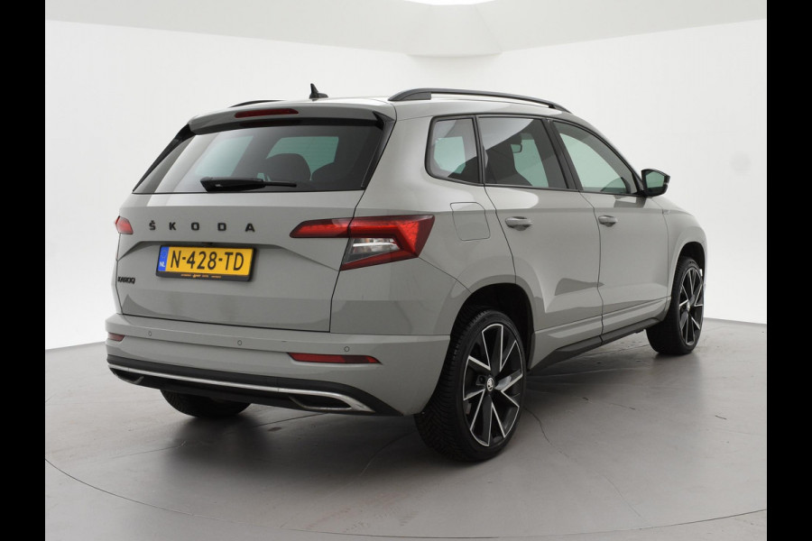 Škoda Karoq 1.5 TSI ACT 150 PK DSG SPORTLINE + CANTON AUDIO | STEEL GREY | CAMERA | 19 INCH | VIRTUAL | SFEER