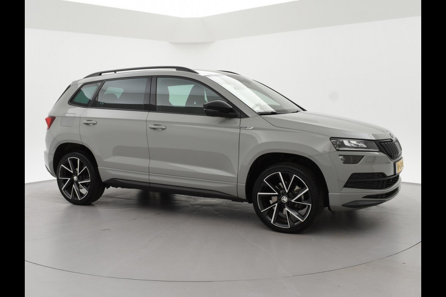 Škoda Karoq 1.5 TSI ACT 150 PK DSG SPORTLINE + CANTON AUDIO | STEEL GREY | CAMERA | 19 INCH | VIRTUAL | SFEER