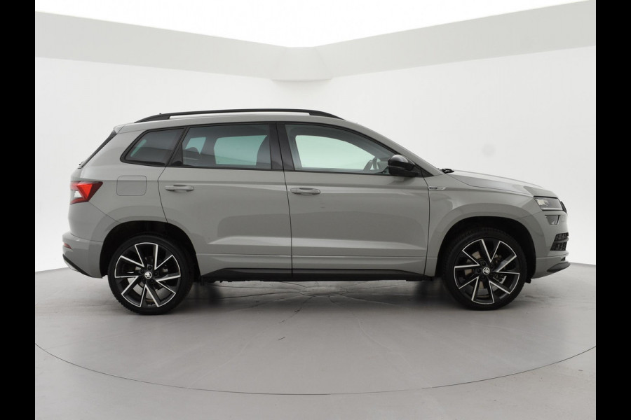 Škoda Karoq 1.5 TSI ACT 150 PK DSG SPORTLINE + CANTON AUDIO | STEEL GREY | CAMERA | 19 INCH | VIRTUAL | SFEER