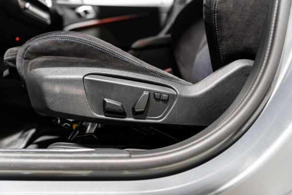 BMW 1-serie 118i M-Sport Pano HUD HK Muziek Kuipstoelen BTW