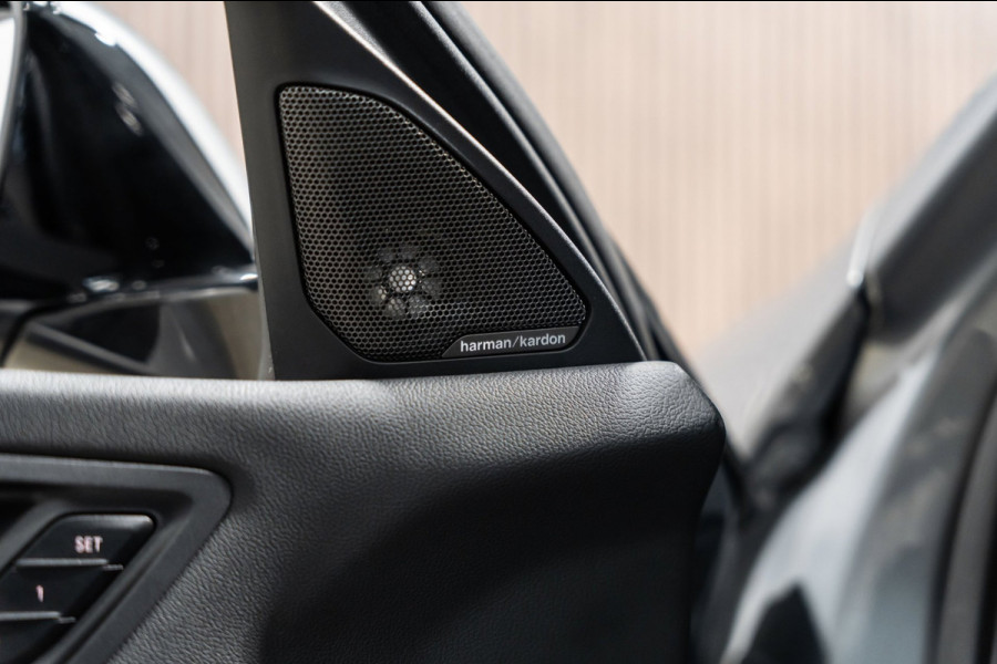 BMW 1-serie 118i M-Sport Pano HUD HK Muziek Kuipstoelen BTW