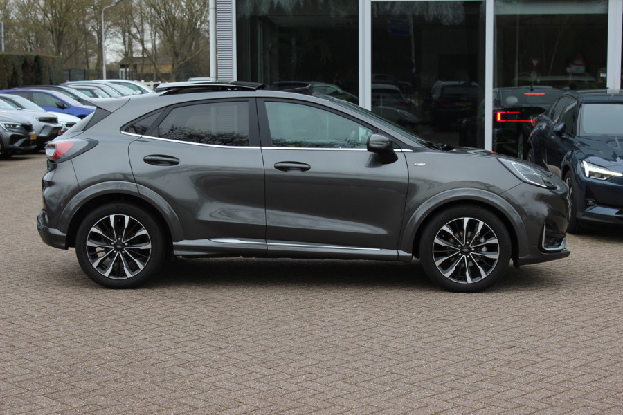 Ford Puma 1.0 EcoBoost Hybrid ST-Line X Vignale 155pk / NL Auto! / Full option! / Trekhaak / Panoramadak / Camera / Leder / CarPlay / B&O / 18'' / Keyless / Stuur+Stoelverwarming / Dodehoek / DAB / Verwarmde voorruit / ACC