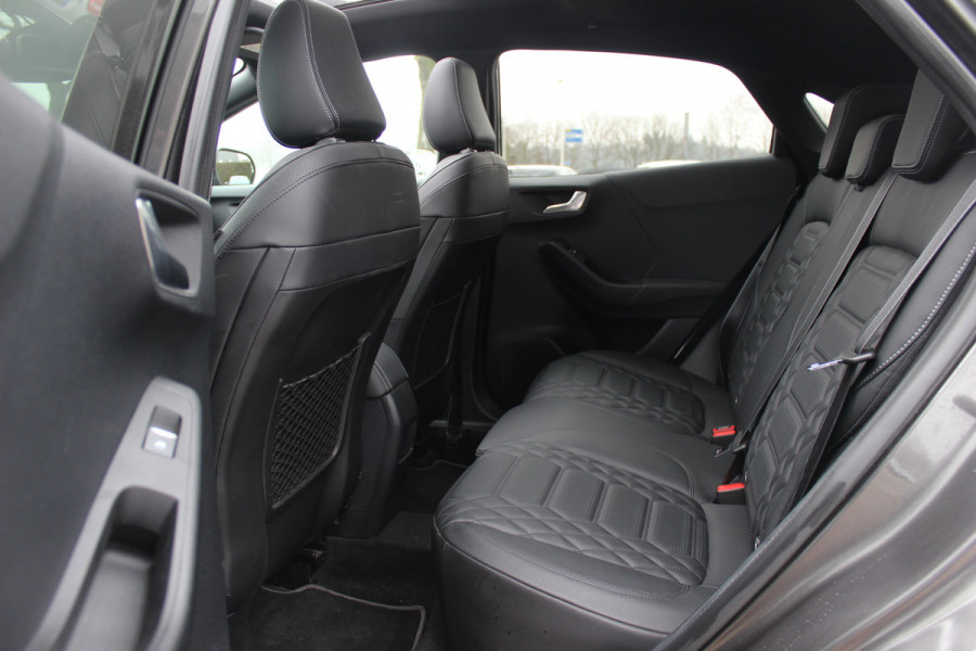 Ford Puma 1.0 EcoBoost Hybrid ST-Line X Vignale 155pk / NL Auto! / Full option! / Trekhaak / Panoramadak / Camera / Leder / CarPlay / B&O / 18'' / Keyless / Stuur+Stoelverwarming / Dodehoek / DAB / Verwarmde voorruit / ACC