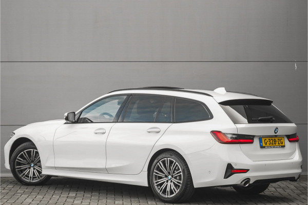 BMW 3 Serie Touring 330i High Executive Pano HUD ACC Trekhaak Stoel & Stuurverw