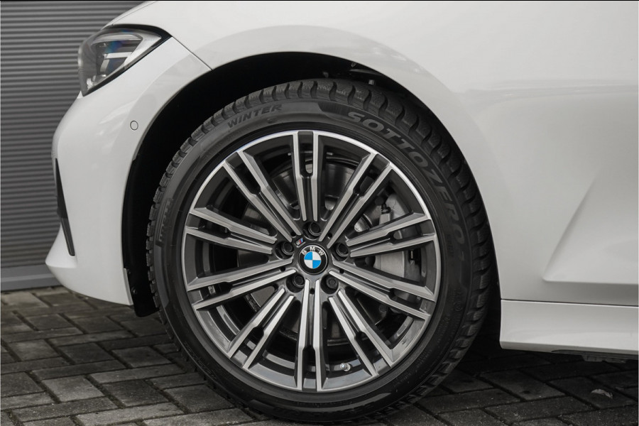 BMW 3 Serie Touring 330i High Executive Pano HUD ACC Trekhaak Stoel & Stuurverw