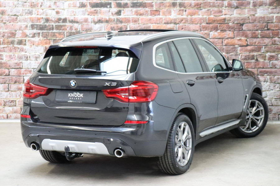BMW X3 xDrive20i High Executive xLine Automaat / Panoramadak / Trekhaak / Navigatiesysteem Professional / Leder / Comfortstoelen Elektrisch Verstelbaar / Stuurwielverwarming / Chrome Line / Stoelventilatie / Hifi / Multifunctioneel Instrumentendisplay / LED /