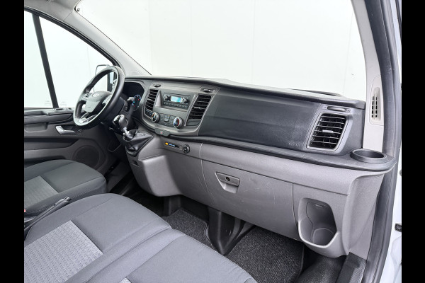 Ford Transit Custom 280 2.0TDCI L1H1 Trend 3-Persoons Trekhaak Airco Cruise Control Bluetooth Pdc Betonplex vloer Wandbetimmering Kasteninbouw Achterdeuren Schuifdeur 1e Eigenaar Euro 6 Origineel Nederlandse Auto