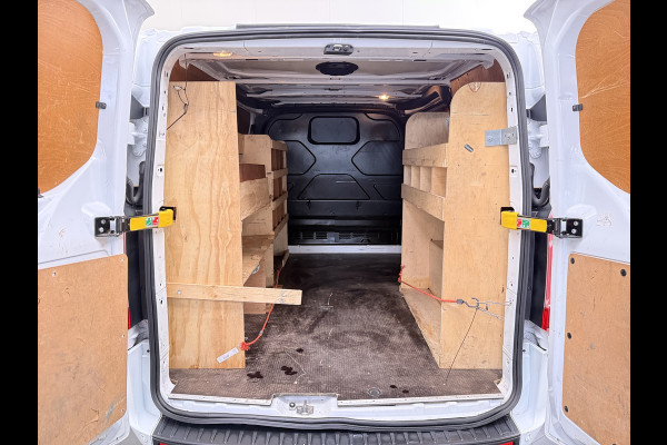 Ford Transit Custom 280 2.0TDCI L1H1 Trend 3-Persoons Trekhaak Airco Cruise Control Bluetooth Pdc Betonplex vloer Wandbetimmering Kasteninbouw Achterdeuren Schuifdeur 1e Eigenaar Euro 6 Origineel Nederlandse Auto