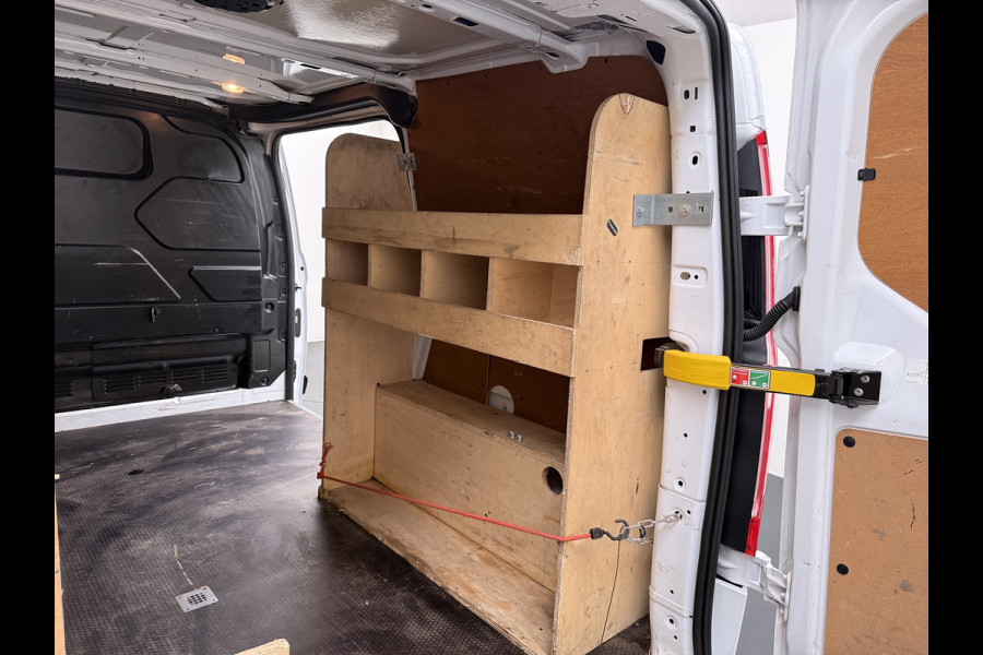 Ford Transit Custom 280 2.0TDCI L1H1 Trend 3-Persoons Trekhaak Airco Cruise Control Bluetooth Pdc Betonplex vloer Wandbetimmering Kasteninbouw Achterdeuren Schuifdeur 1e Eigenaar Euro 6 Origineel Nederlandse Auto