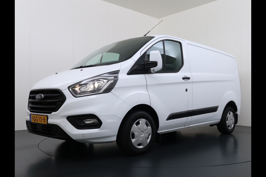 Ford Transit Custom 280 2.0TDCI L1H1 Trend 3-Persoons Trekhaak Airco Cruise Control Bluetooth Pdc Betonplex vloer Wandbetimmering Kasteninbouw Achterdeuren Schuifdeur 1e Eigenaar Euro 6 Origineel Nederlandse Auto