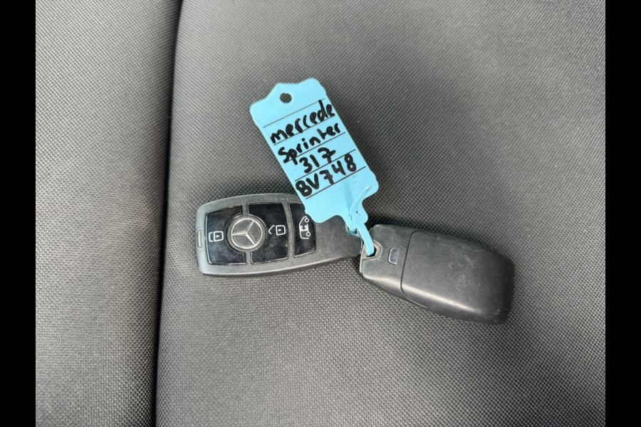 Mercedes-Benz Sprinter 317 1.9 CDI Automaat L3H2 LED 3,5t Trekhaak Climate Control Cruise Control Navigatie Carplay Lucht Geveerde Stoel Stoelverwarming