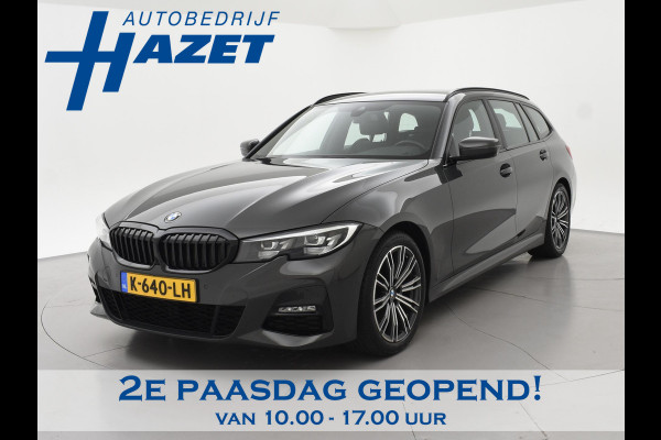 BMW 3 Serie Touring 318i AUT. M-SPORT DRAVITGRAU + SPORTSTOELEN | CAMERA | MEMORY | HIFI | SFEERVERLICHTING | CARPLAY