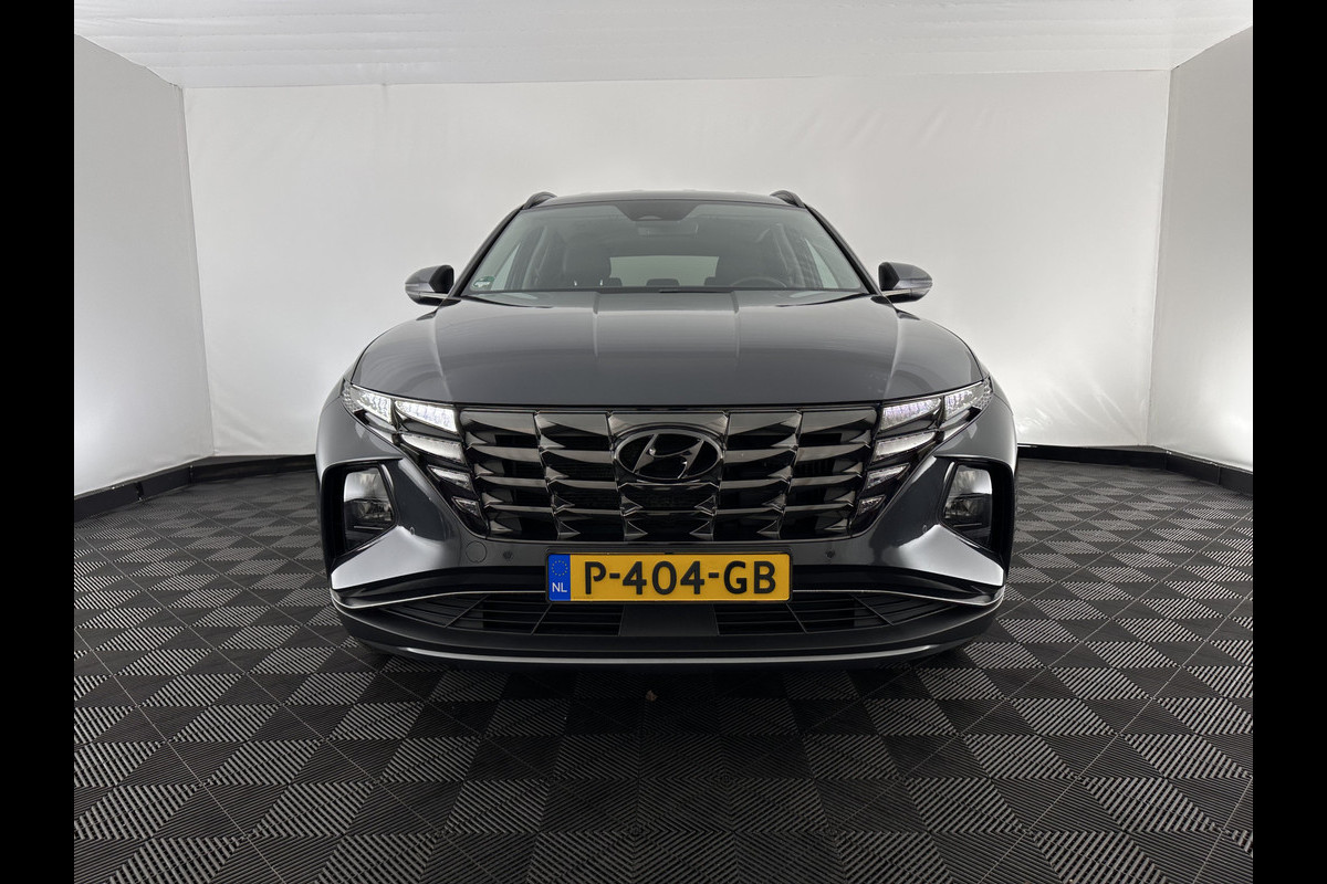 Hyundai Tucson 1.6 T-GDI PHEV Comfort Smart 4WD (INCL.BTW) *LEATHER | FULL-LED | ADAPTIVE-CRUISE | HEATED-COMFORTSEATS | KEYLESS | CAMERA | DIGI-COCKPIT | PRIVACY-GLASS | SHIFT-PADDLES | ECC | PDC | 19''ALU*