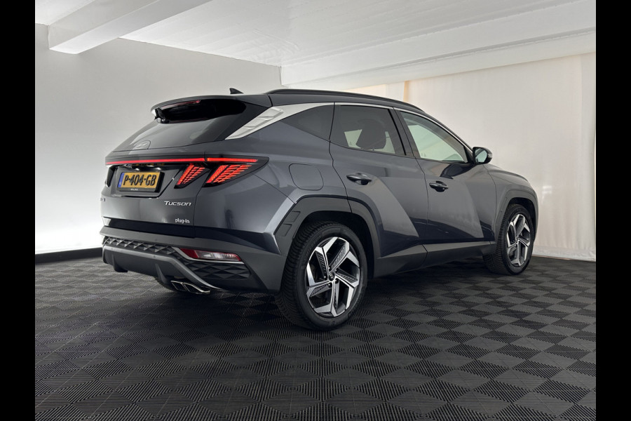Hyundai Tucson 1.6 T-GDI PHEV Comfort Smart 4WD (INCL.BTW) *LEATHER | FULL-LED | ADAPTIVE-CRUISE | HEATED-COMFORTSEATS | KEYLESS | CAMERA | DIGI-COCKPIT | PRIVACY-GLASS | SHIFT-PADDLES | ECC | PDC | 19''ALU*