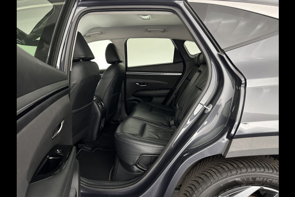 Hyundai Tucson 1.6 T-GDI PHEV Comfort Smart 4WD (INCL.BTW) *LEATHER | FULL-LED | ADAPTIVE-CRUISE | HEATED-COMFORTSEATS | KEYLESS | CAMERA | DIGI-COCKPIT | PRIVACY-GLASS | SHIFT-PADDLES | ECC | PDC | 19''ALU*