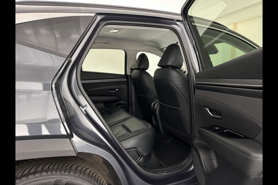 Hyundai Tucson 1.6 T-GDI PHEV Comfort Smart 4WD (INCL.BTW) *LEATHER | FULL-LED | ADAPTIVE-CRUISE | HEATED-COMFORTSEATS | KEYLESS | CAMERA | DIGI-COCKPIT | PRIVACY-GLASS | SHIFT-PADDLES | ECC | PDC | 19''ALU*