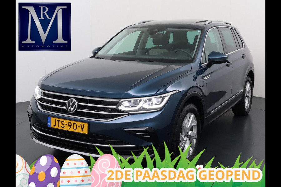 Volkswagen Tiguan 1.4 TSI eHybrid PHEV VAN €33.900,- NU VOOR SLECHTS €30.877,- Uw LENTEVOORDEEL €3.023,- |SUPER COMPLEET| SCHUIF/ KANTELDAK| DODE HOEK| ELEK. ACHTERKLEP| DIG. DASH | CAMERA| RIJKLAAR GELEVERD INCL. 12 MND BOVAG GARANTIE