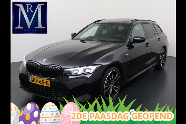 BMW 3 Serie Touring 320e VAN € 42.899,- VOOR € 39.877,- UW LENTEVOORDEEL: €3.022,-! | M-SPORT | FACELIFT| PANO|1.STE EIGENAAR, DEALER OH. | LEER | ELEK. TREKHAAK| FABRIEKSGARANTIE T/M 08 2027| LEER| STOELVERWARMING| 19 INCH! SUPER COMPLEET!