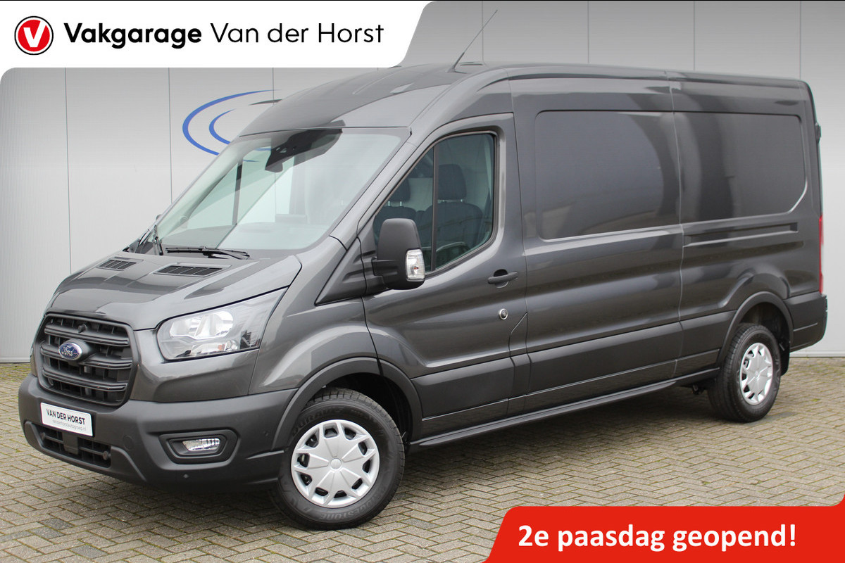 Ford Transit 350 2.0 TDCI L3H2 Trend 130pk Trend. Net ingereden, uit voorraad leverbaar ! Volautm. airco, metallic lak, lane- en side assist, adaptive cruise cntrl, navigatie by Apple carplay/Android auto cntrl, bijrijdersbank, USB aansluiting etc.