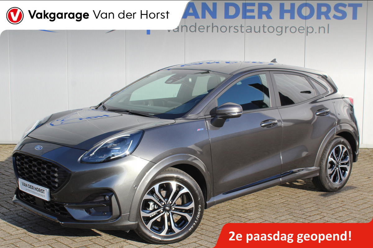 Ford Puma 1.0-125pk EcoBoost Hybrid ST-Line. April 2024 ! Slechts 11.800km ! Autm. airco, navigatie, telefoonvoorb., camera, pdc v+a, parkeerassistent, LED verl., metallic lak, LM wielen, stoel-, stuur- en voorraamverw., lane- en sideassist, adapt. cruise cntrl etc