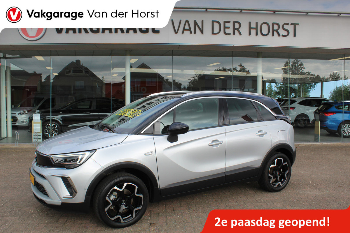 Opel Crossland 1.2-110pk Turbo 'Elegance'. Mooie en luxe hoogzitter met weinig km's ! Volautm. airco dual, cruise control, camera, comfortstoelen, metallic lak,  LM wielen, navigatie, telefoonvoorb., lane- en side assist, parkeersensoren v+a,  LED verlichting  etc.