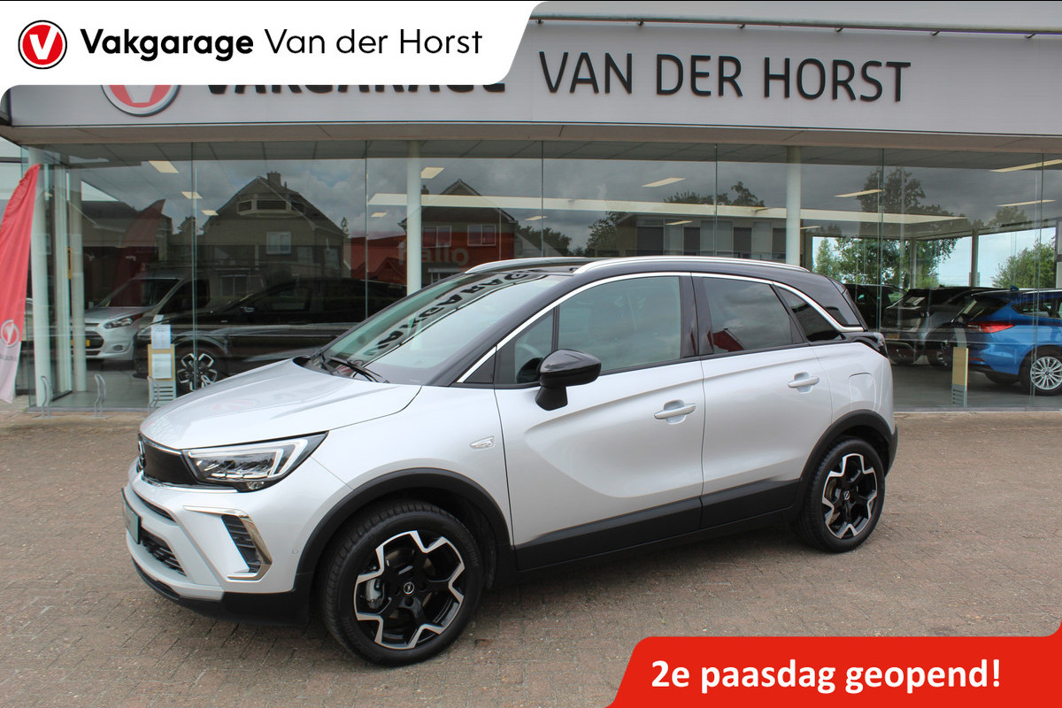 Opel Crossland 1.2-110pk Turbo 'Elegance'. Mooie en luxe hoogzitter met weinig km's ! Volautm. airco dual, cruise control, camera, comfortstoelen, metallic lak,  LM wielen, navigatie, telefoonvoorb., lane- en side assist, parkeersensoren v+a,  LED verlichting  etc.