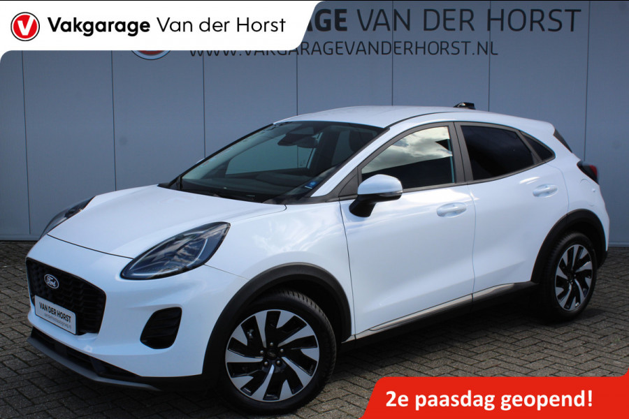 Ford Puma 1.0-125pk EcoBoost Mild-Hybrid Titanium. Fabr. garantie t/m 24-03-2029 ! Eén van de fijnst rijdende auto in z'n klasse ! Autm. airco, stoel-, stuur- en voorraamverw., cruise control, LED verl., navigatie, telefoonvoorb., DAB radio, Apple carplay/Android auto etc.