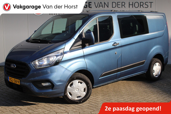 Ford Transit Custom 300 2.0-130pk TDCI L1H1 Trend Dubb. cabine. Trekgewicht 2.500kg ! Airco, stoel- spiegelverwarming, bijrijdersstoel, dubbele cabine, trekhaak, parkeersensoren v+a, navigatie, telefoonvoorb., metallic lak