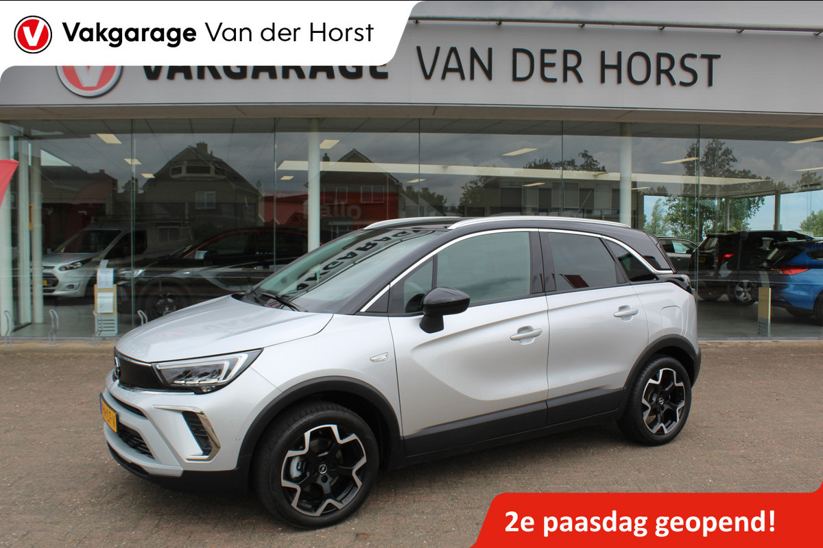Opel Crossland 1.2-110pk Turbo 'Elegance'. Mooie en luxe hoogzitter met weinig km's ! Volautm. airco dual, cruise control, camera, comfortstoelen, metallic lak,  LM wielen, navigatie, telefoonvoorb., lane- en side assist, parkeersensoren v+a,  LED verlichting  etc.