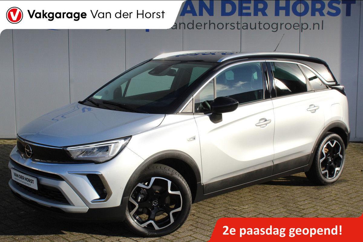 Opel Crossland 1.2-110pk Turbo 'Elegance'. Mooie en luxe hoogzitter met weinig km's ! Volautm. airco dual, cruise control, camera, comfortstoelen, metallic lak,  LM wielen, navigatie, telefoonvoorb., lane- en side assist, parkeersensoren v+a,  LED verlichting  etc.