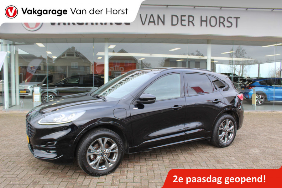 Ford Kuga 2.5-225pk Plug-in Hybrid ST-Line X. Hybride rijden voor een reële prijs ! Adaptive Cruise Control, Stoel- en voorraamverwarming, Climate Control, Metallic lak, Camera v+a, Elektr. achterklep, Side- en lane assist etc.