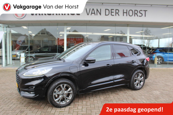 Ford Kuga 2.5-225pk Plug-in Hybrid ST-Line X. Hybride rijden voor een reële prijs ! Adaptive Cruise Control, Stoel- en voorraamverwarming, Climate Control, Metallic lak, Camera v+a, Elektr. achterklep, Side- en lane assist etc.