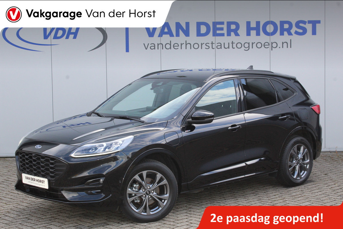 Ford Kuga 2.5-225pk Plug-in Hybrid ST-Line X. Hybride rijden voor een reële prijs ! Adaptive Cruise Control, Stoel- en voorraamverwarming, Climate Control, Metallic lak, Camera v+a, Elektr. achterklep, Side- en lane assist etc.