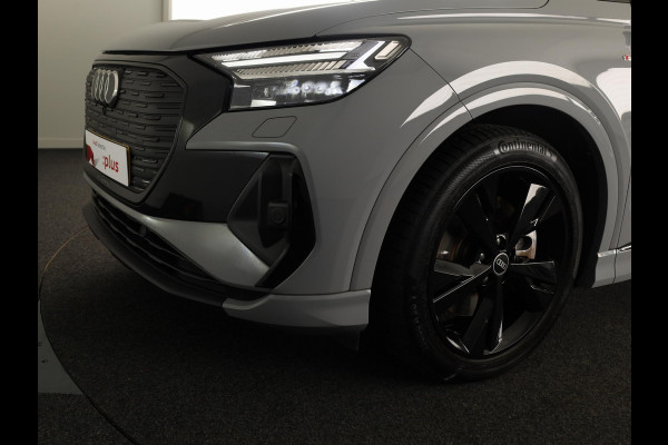 Audi Q4 e-tron 40 Launch edition S Competition 77 kWh 204 pk | SoH 97% | Navigatie | Warmtepomp | Parkeersensoren | Achteruitrijcamera | Stoelverwarming | S-Line |