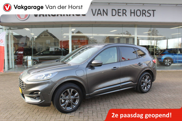 Ford Kuga 2.5-225pk Plug-in Hybrid ST-Line X. Hybride rijden voor een reële prijs ! Adaptive Cruise Control, Stoel-, achterbank, stuur- en voorraamverwarming, autm. airco dual, camera v+a, elektr. achterklep, side- en lane assist etc.