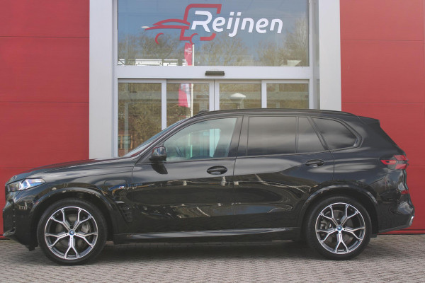 BMW X5 xDrive50e 490PK M-SPORT | PANORAMA SCHUIF/KANTEL DAK "SKY LOUNGE" | COMFORT STOELEN ELEKTRISCH VERSTELBAAR MET GEHEUGENFUNCTIE EN VERWARMBAAR VOOR EN ACHTER | LEDEREN BEKLEDING BMW INDIVIDUAL ZWART | EDELHOUT INTERIEURLIJSTEN | RIJASSISTENT-SYSTEEM DRIVING ASSISTANT PROFFESIONAL MET O.A. DODEHOEK DETECTIE EN ADAPTIVE CRUISE CONTROL | TRAVEL PAKKET | INNOVATIE-PAKKET: PARKEERASSISTENT-PAKKET PROFESSIONAL/ADAPTIEVE LED KOPLAMPEN/HARMAN/KARDON AUDIO SYSTEM/BMW LIVE PROFESSIONAL/RIJASSISTEN-SYSTEEM BMW GESTURE CONTROL/RIJSTROOK ASSISTENT/RIJSTROOKWISSEL ASSISTENT/BOTSWAARS