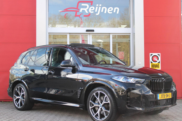 BMW X5 xDrive50e 490PK M-SPORT | PANORAMA SCHUIF/KANTEL DAK "SKY LOUNGE" | COMFORT STOELEN ELEKTRISCH VERSTELBAAR MET GEHEUGENFUNCTIE EN VERWARMBAAR VOOR EN ACHTER | LEDEREN BEKLEDING BMW INDIVIDUAL ZWART | EDELHOUT INTERIEURLIJSTEN | RIJASSISTENT-SYSTEEM DRIVING ASSISTANT PROFFESIONAL MET O.A. DODEHOEK DETECTIE EN ADAPTIVE CRUISE CONTROL | TRAVEL PAKKET | INNOVATIE-PAKKET: PARKEERASSISTENT-PAKKET PROFESSIONAL/ADAPTIEVE LED KOPLAMPEN/HARMAN/KARDON AUDIO SYSTEM/BMW LIVE PROFESSIONAL/RIJASSISTEN-SYSTEEM BMW GESTURE CONTROL/RIJSTROOK ASSISTENT/RIJSTROOKWISSEL ASSISTENT/BOTSWAARS
