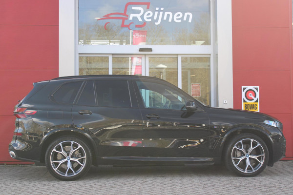 BMW X5 xDrive50e 490PK M-SPORT | PANORAMA SCHUIF/KANTEL DAK "SKY LOUNGE" | COMFORT STOELEN ELEKTRISCH VERSTELBAAR MET GEHEUGENFUNCTIE EN VERWARMBAAR VOOR EN ACHTER | LEDEREN BEKLEDING BMW INDIVIDUAL ZWART | EDELHOUT INTERIEURLIJSTEN | RIJASSISTENT-SYSTEEM DRIVING ASSISTANT PROFFESIONAL MET O.A. DODEHOEK DETECTIE EN ADAPTIVE CRUISE CONTROL | TRAVEL PAKKET | INNOVATIE-PAKKET: PARKEERASSISTENT-PAKKET PROFESSIONAL/ADAPTIEVE LED KOPLAMPEN/HARMAN/KARDON AUDIO SYSTEM/BMW LIVE PROFESSIONAL/RIJASSISTEN-SYSTEEM BMW GESTURE CONTROL/RIJSTROOK ASSISTENT/RIJSTROOKWISSEL ASSISTENT/BOTSWAARS
