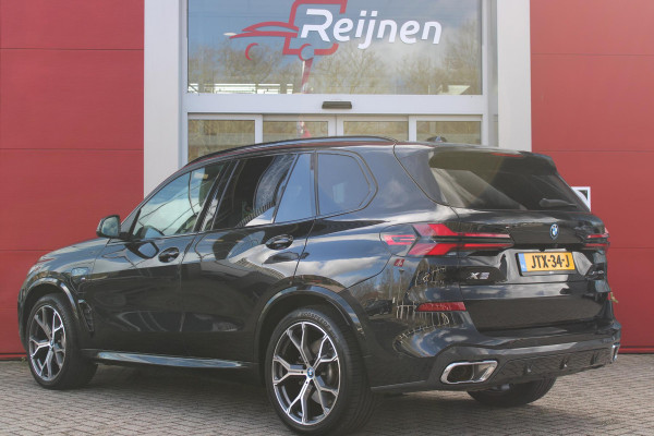 BMW X5 xDrive50e 490PK M-SPORT | PANORAMA SCHUIF/KANTEL DAK "SKY LOUNGE" | COMFORT STOELEN ELEKTRISCH VERSTELBAAR MET GEHEUGENFUNCTIE EN VERWARMBAAR VOOR EN ACHTER | LEDEREN BEKLEDING BMW INDIVIDUAL ZWART | EDELHOUT INTERIEURLIJSTEN | RIJASSISTENT-SYSTEEM DRIVING ASSISTANT PROFFESIONAL MET O.A. DODEHOEK DETECTIE EN ADAPTIVE CRUISE CONTROL | TRAVEL PAKKET | INNOVATIE-PAKKET: PARKEERASSISTENT-PAKKET PROFESSIONAL/ADAPTIEVE LED KOPLAMPEN/HARMAN/KARDON AUDIO SYSTEM/BMW LIVE PROFESSIONAL/RIJASSISTEN-SYSTEEM BMW GESTURE CONTROL/RIJSTROOK ASSISTENT/RIJSTROOKWISSEL ASSISTENT/BOTSWAARS