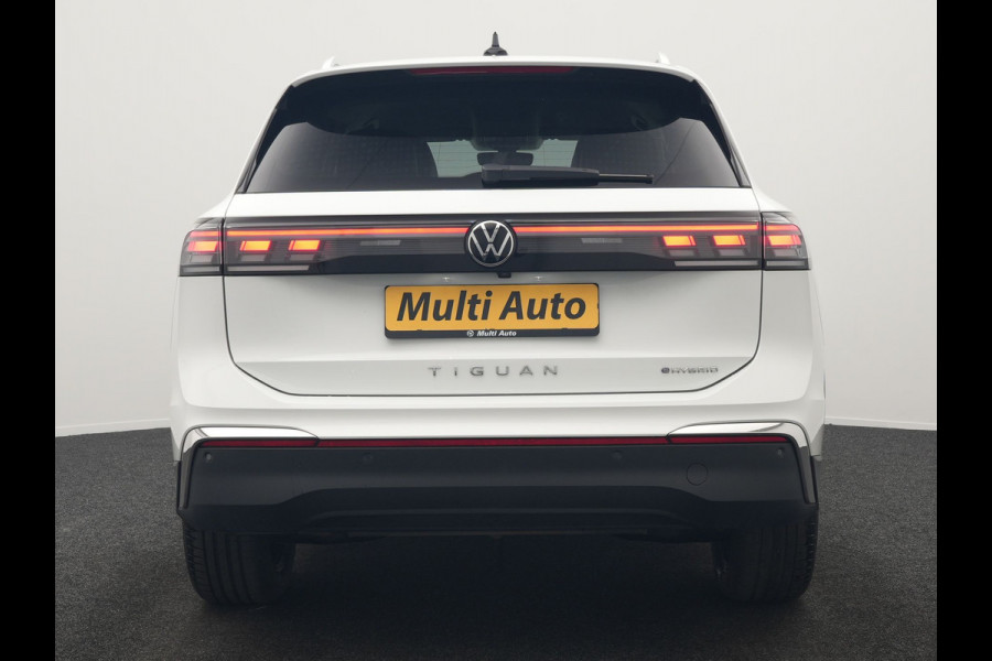Volkswagen Tiguan 1.5 eHybrid Elegance PHEV 272pk Dealer O.H. | Trekhaak Af Fabriek | Adaptive Cruise | 360 Camera | Alcantara Sportstoelen Massage & Verwarmd | IQ Light | Stuur Verwarmd | Sfeerverlichting | Keyless | Blis | Virtual | Plug In Hybrid |