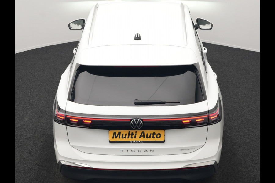 Volkswagen Tiguan 1.5 eHybrid Elegance PHEV 272pk Dealer O.H. | Trekhaak Af Fabriek | Adaptive Cruise | 360 Camera | Alcantara Sportstoelen Massage & Verwarmd | IQ Light | Stuur Verwarmd | Sfeerverlichting | Keyless | Blis | Virtual | Plug In Hybrid |