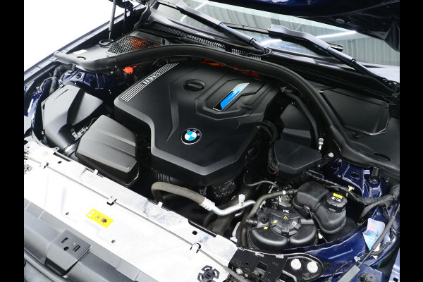 BMW 3 Serie Touring 320e Shadow Line | Trekhaak | Adaptive Cruise | Memory | Stoelverwarming | PDC | Dodehoek | Carplay