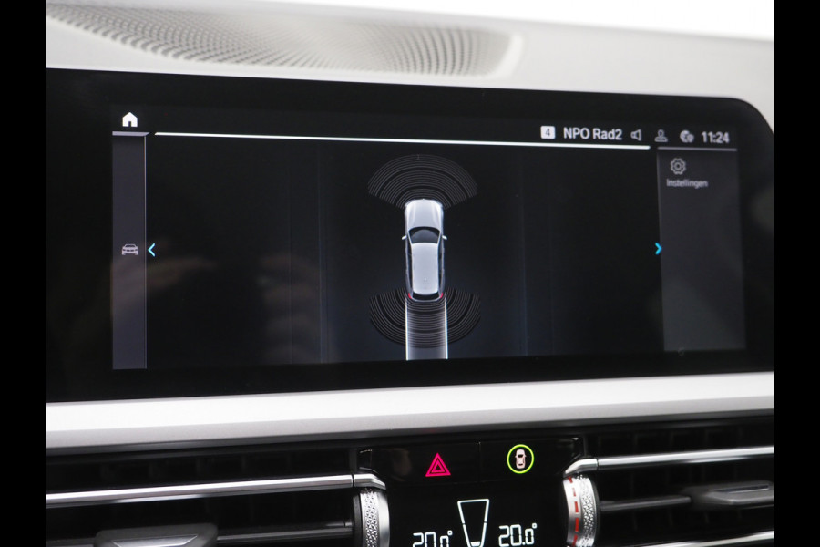 BMW 3 Serie Touring 320e Shadow Line | Trekhaak | Adaptive Cruise | Memory | Stoelverwarming | PDC | Dodehoek | Carplay