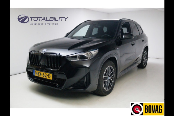 BMW X1 xDrive25e M-sport 245 PK automaat | Stoelverwarming + massage | Stuurverwarming | Navigatie Keyless, Elektrische achterklep, Privacy glas, App-connect, Cruise, Led