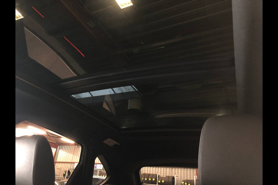 BMW 2 Serie Active Tourer 218i High Executive Edition sportint | leer | pano | stoelverw | navi | camera | cruise| headup